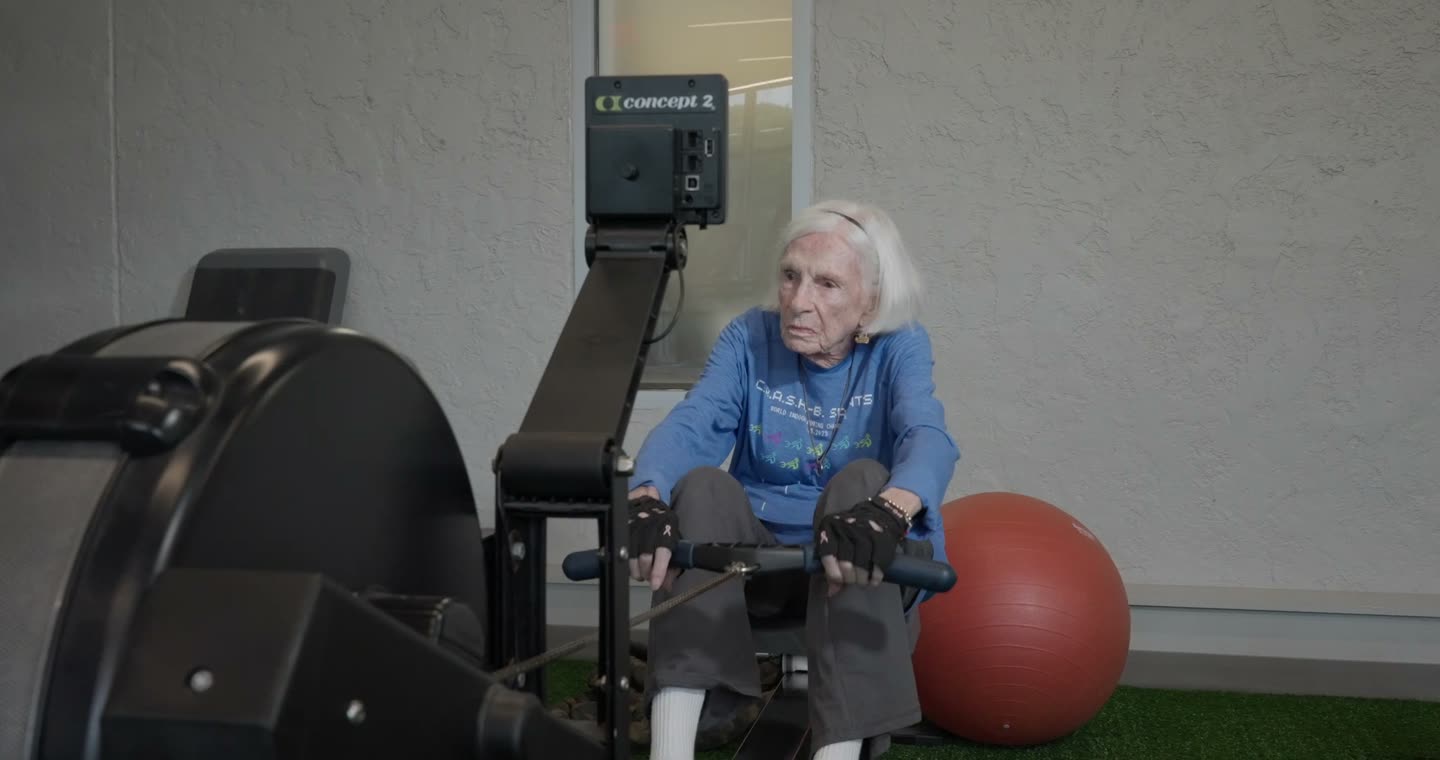 Dottie Stewart on an indoor rowing machine