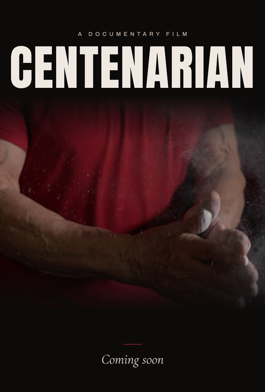 Centenarian teaser poster — a chalk clap against a red field